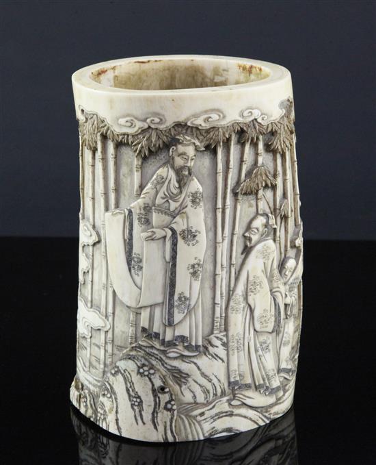 A Japanese ivory brush pot, late 19th century, 16cm, old repairs to base and base panel lacking